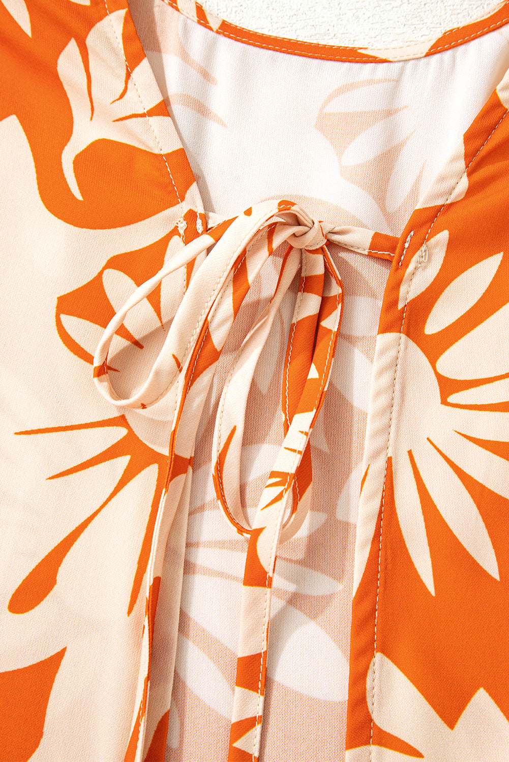 Orange Floral Print Knotted Open Back Long Sleeve Blouse