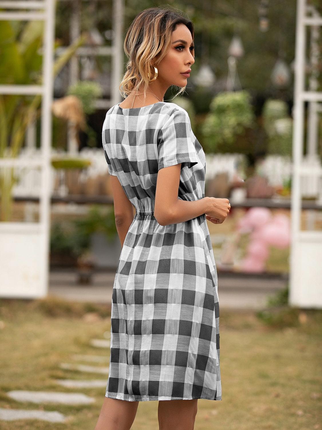 Smocked Plaid Round Neck Short Sleeve Dress Carauana Store
