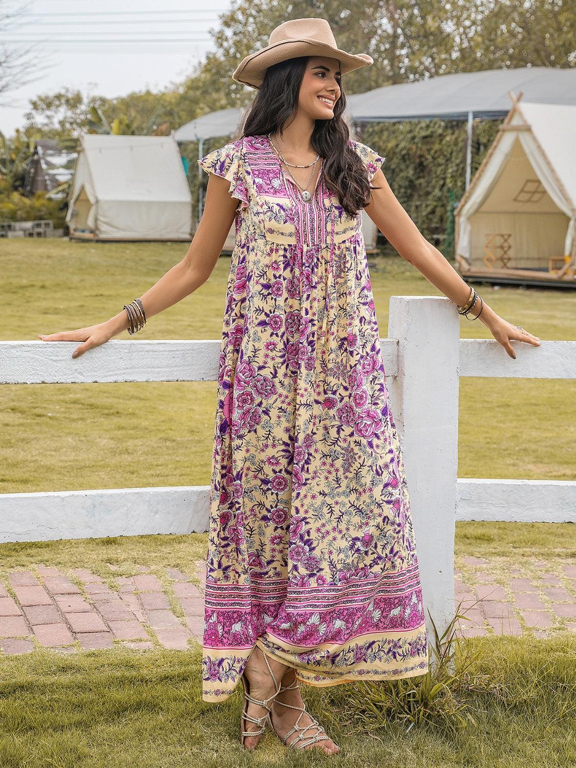 Ruffled Printed Tie Neck Cap Sleeve Dress Carauana Store