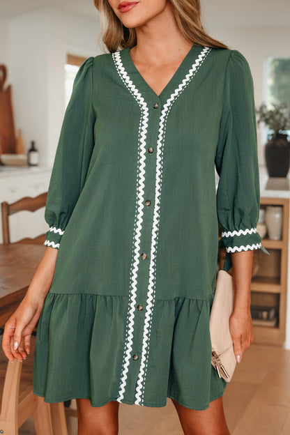 Etuikleid mit kontrastierender Ripsbandeinfassung, Knopfleiste, V-Ausschnitt und geknoteten Armbandärmeln