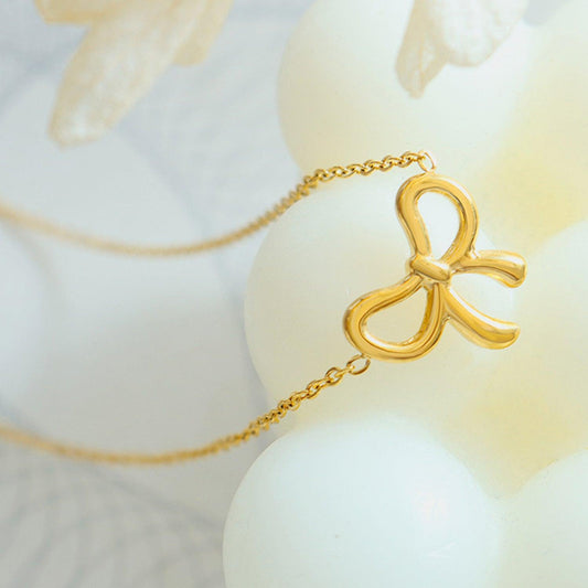 Gold-Plated Titanium Steel Bow Pendant Necklace Carauana Store