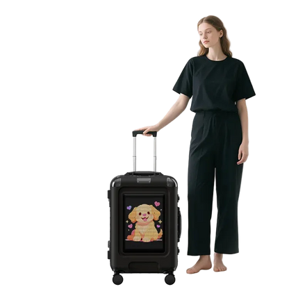 Person holding a black LOY Trolly Smart Suitcase - LED Programmable Smart Luggage with a cartoon dog design