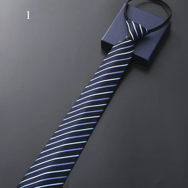 Navy blue tie with white and light blue stripes on a dark gray background