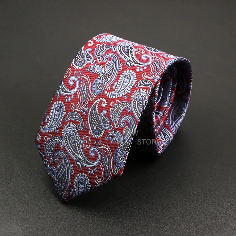 Red paisley patterned tie on a dark gray background
