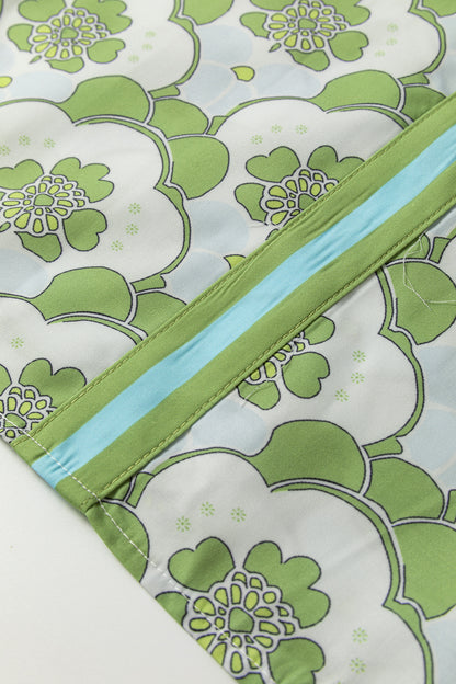 Sommerbluse mit grünem Blumenmuster und kurzen Ärmeln, Rüschen, Rüschen und Wolkenmuster