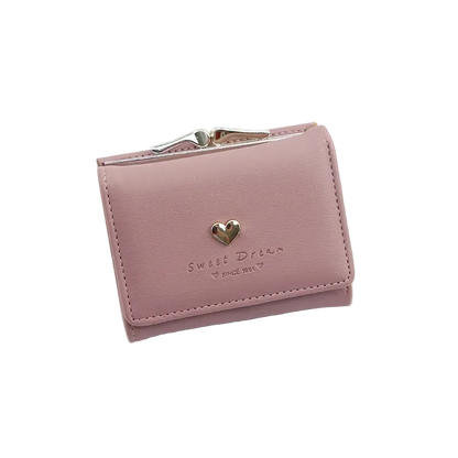 Pink wallet with a heart-shaped logo on a white surface